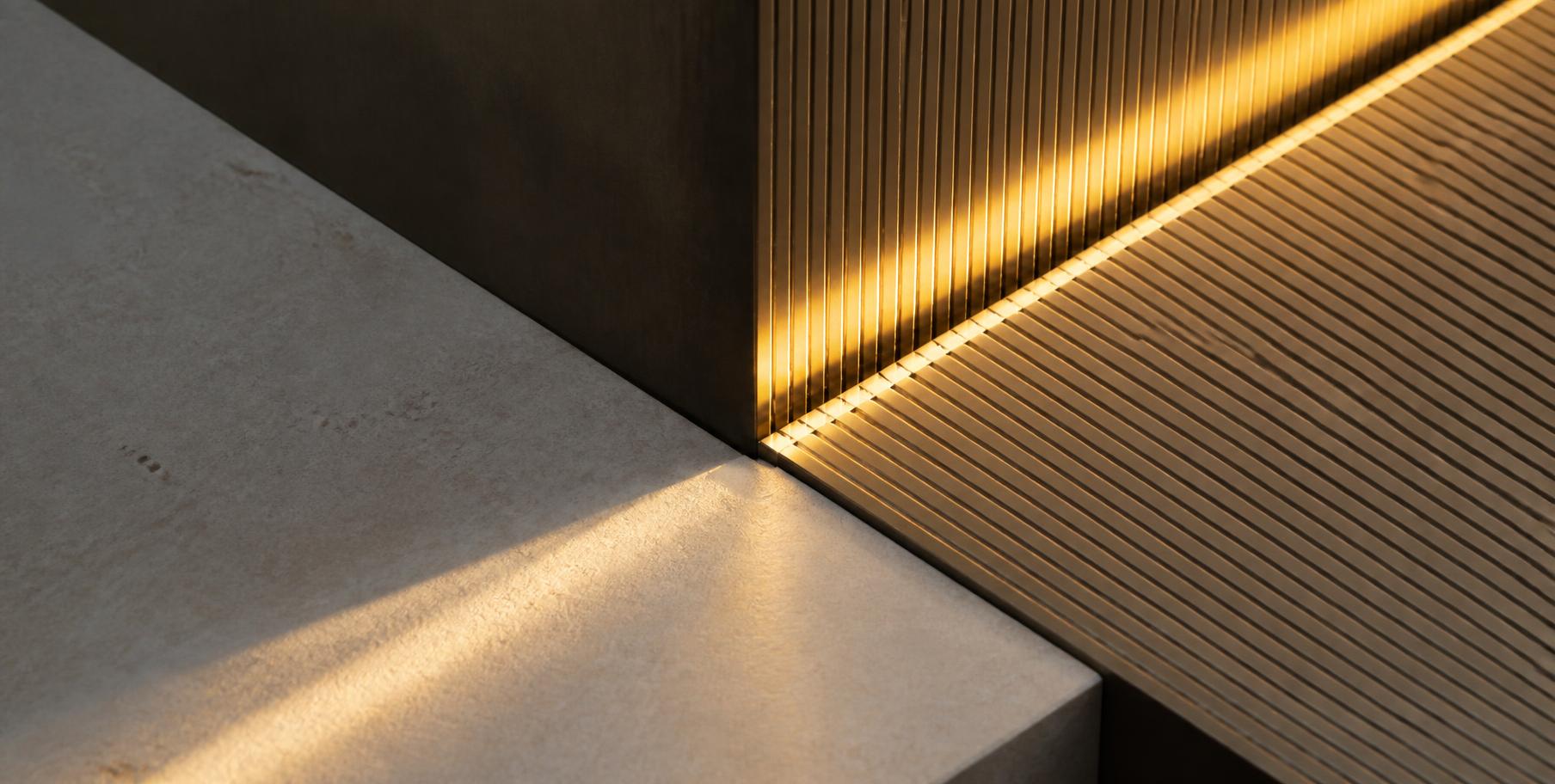 Soft gold light across precise architectural lines